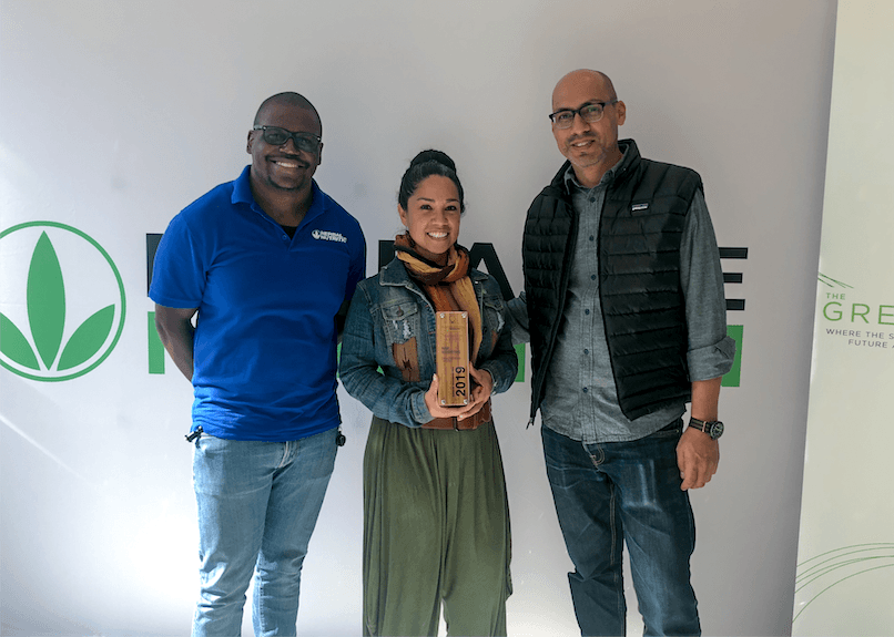 Mikhail Howell (left), Carla Silveira-Hernandez (middle), Efrain Sanchez (right) accepting the 2019 Herbalife Global Innovation Award